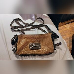 Pre-loved Guess Crossbody Bag in metallic brown with a reptile-inspired texture